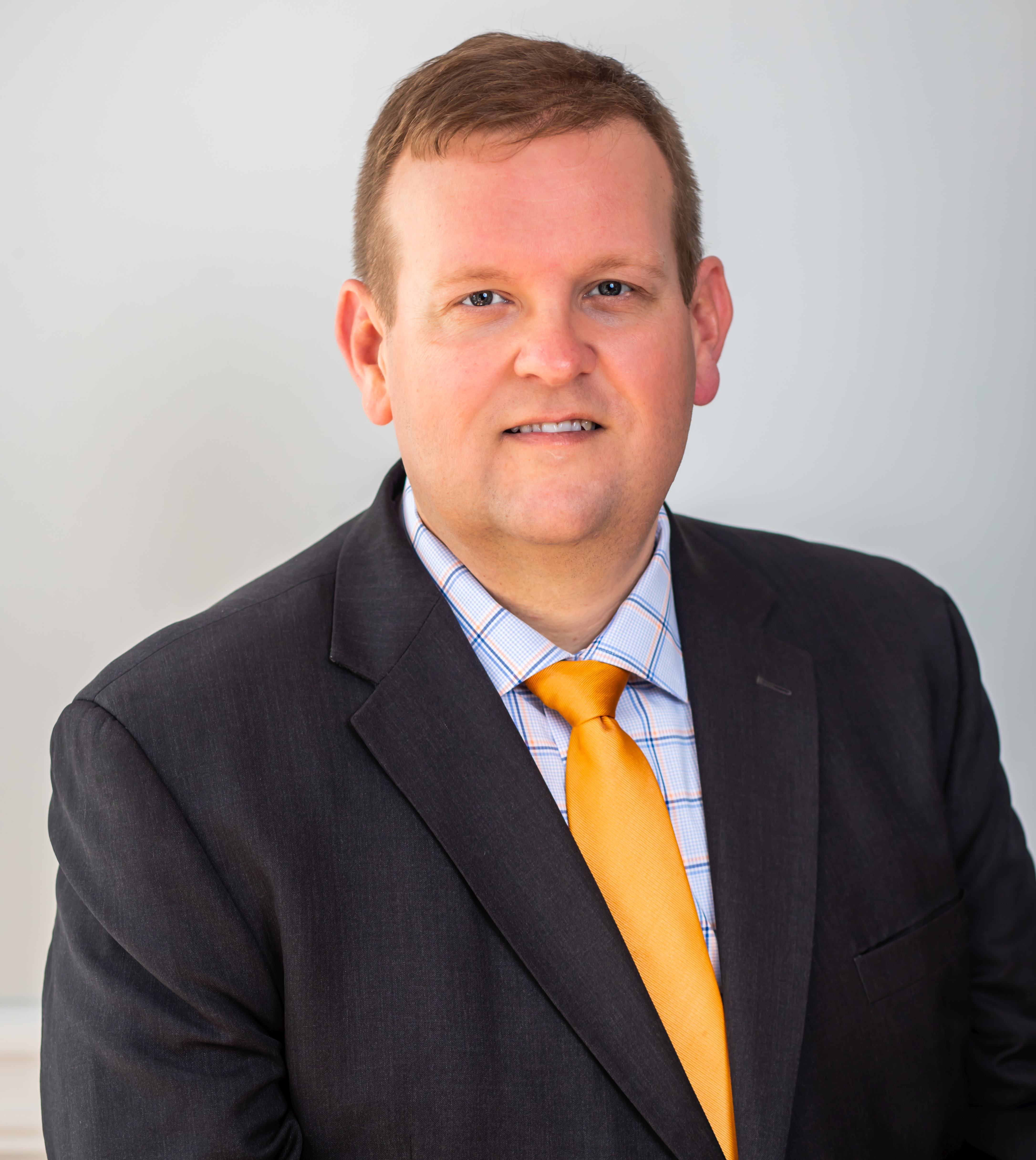 Professional headshot of attorney Philip L. Ellison